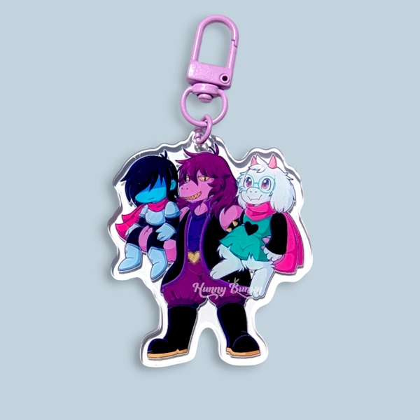 acrylic keychain of three lightners standing together